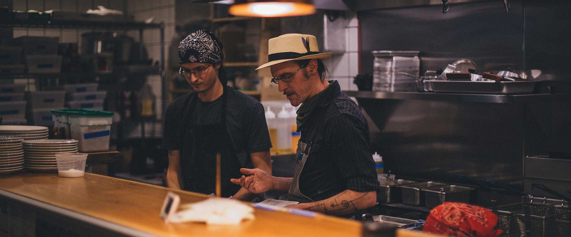 Caucho cooks at work in the kitchen