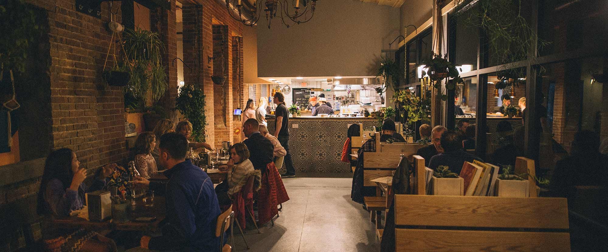 The dining room and booths at Caucho